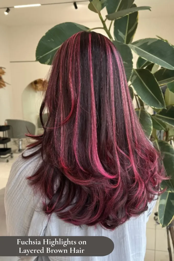 Fuchsia Highlights on Layered Brown Hair