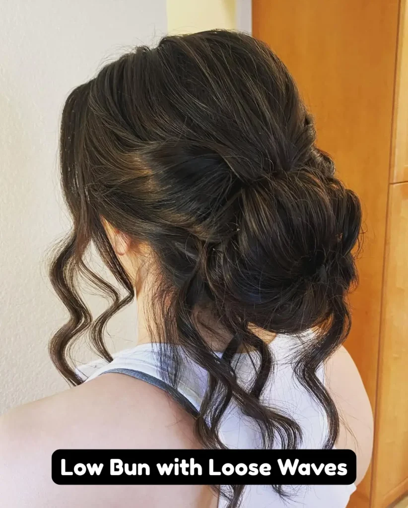 Low Bun with Loose Waves