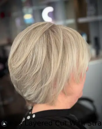 Sleek Layered Cut With Straight-Across Bangs