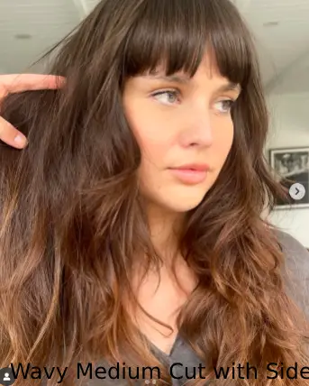  Wavy Medium Cut with Side-Swept Bangs