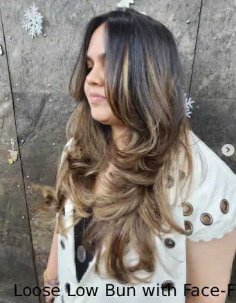 Loose Low Bun with Face-Framing Waves